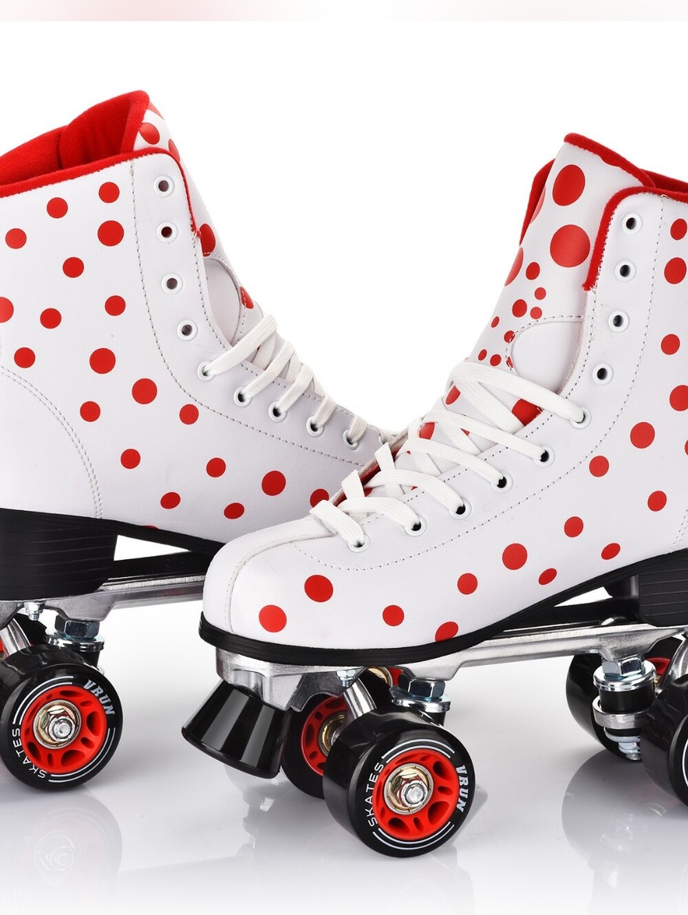 Classic White Roller Skates with Red Polka Dot Accent